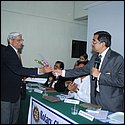 Rtn Dr. Satya Agarwala receiving token of appreciation.JPG